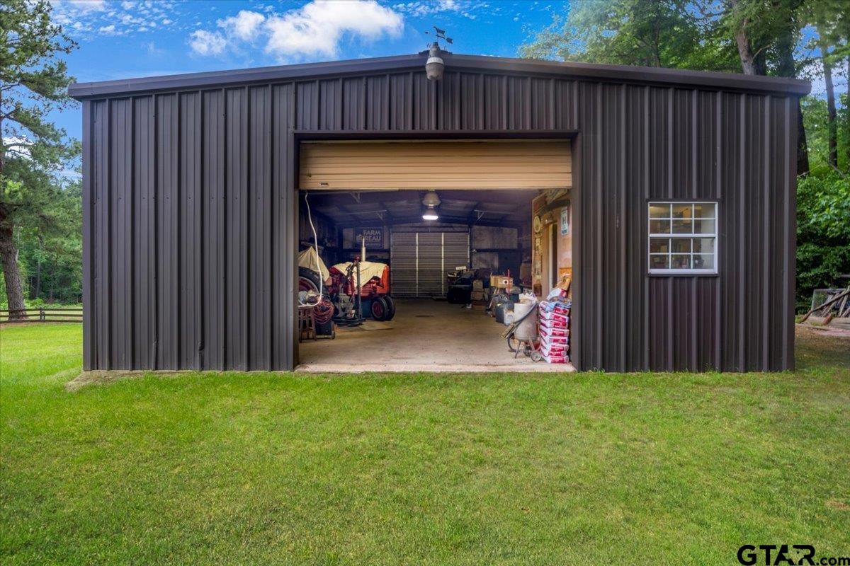 15246 7 League Road Tyler, TX 75703 - Photo 18 of 43 a view of a house with backyard and porch