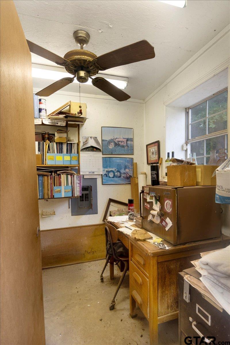 15246 7 League Road Tyler, TX 75703 - Photo 29 of 43 a living room with furniture and a flat screen tv