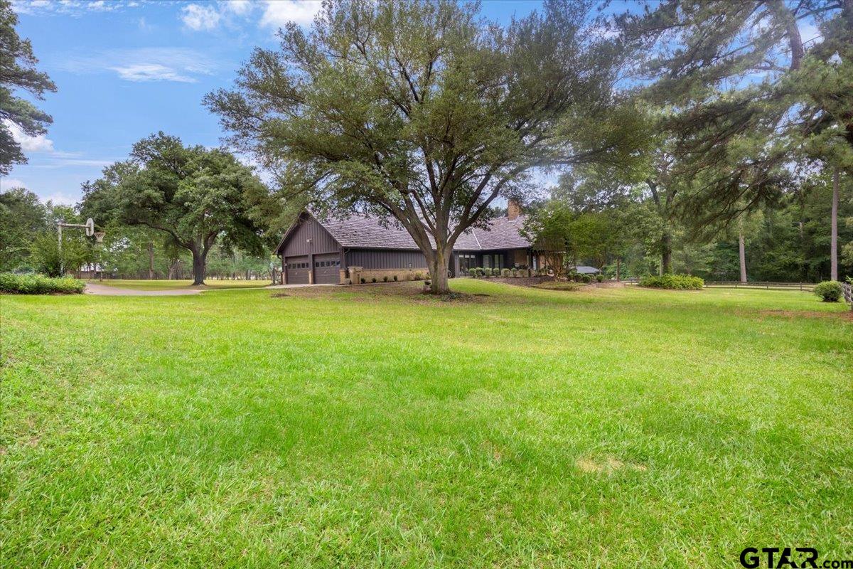15246 7 League Road Tyler, TX 75703 - Photo 32 of 43 a view of a large trees with a big yard
