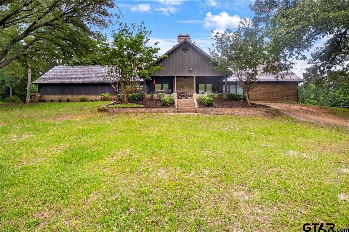 15246 7 League Road Tyler, TX 75703 - Photo 33 of 43 a view of a house with pool and chairs