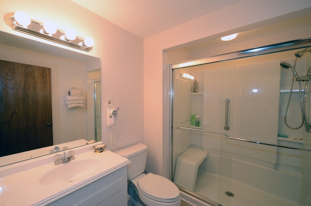 124 Sherbert Road Ashburnham, MA 01430 - Photo 13 of 27 a bathroom with a sink a toilet and shower