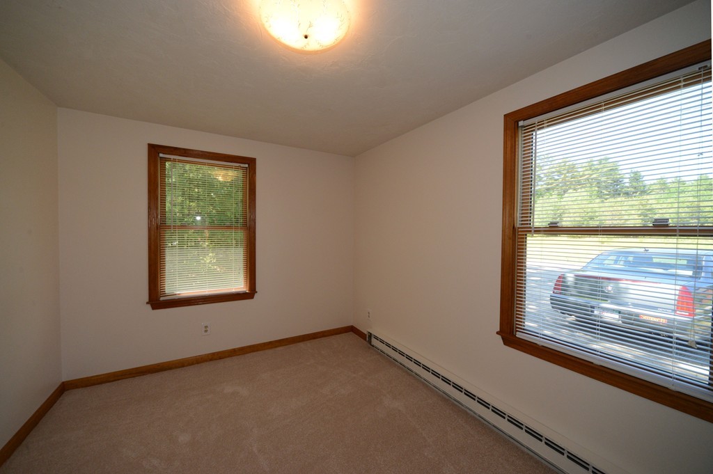124 Sherbert Road Ashburnham, MA 01430 - Photo 15 of 27 an empty room with a window