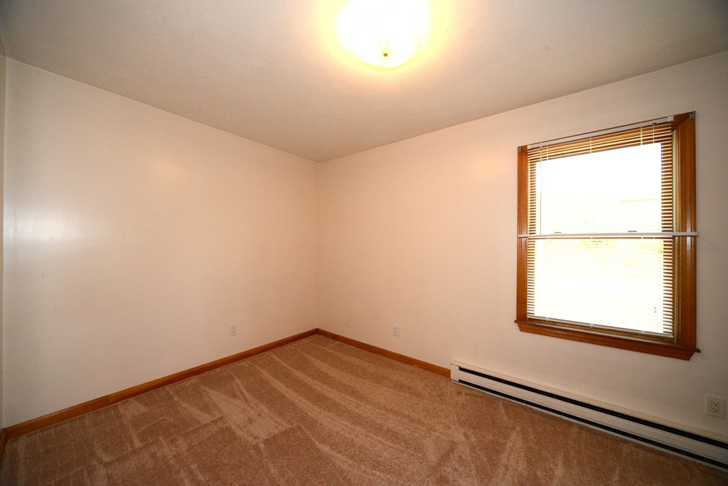 124 Sherbert Road Ashburnham, MA 01430 - Photo 16 of 27 an empty room with a window