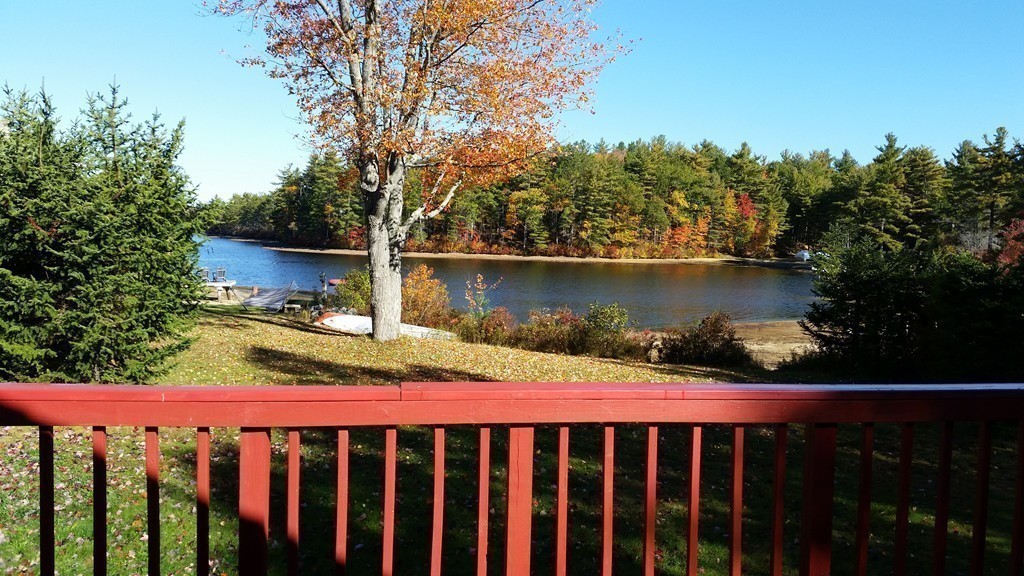 124 Sherbert Road Ashburnham, MA 01430 - Photo 18 of 27 a view of wooden fence and lake from a window