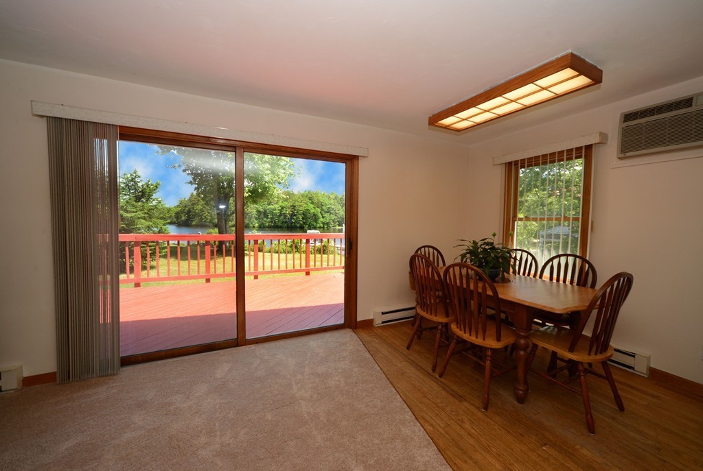 124 Sherbert Road Ashburnham, MA 01430 - Photo 2 of 27 a view of a workspace with furniture and a window