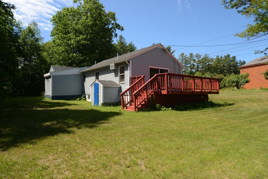 124 Sherbert Road Ashburnham, MA 01430 - Photo 26 of 27 a view of a house with backyard and garden