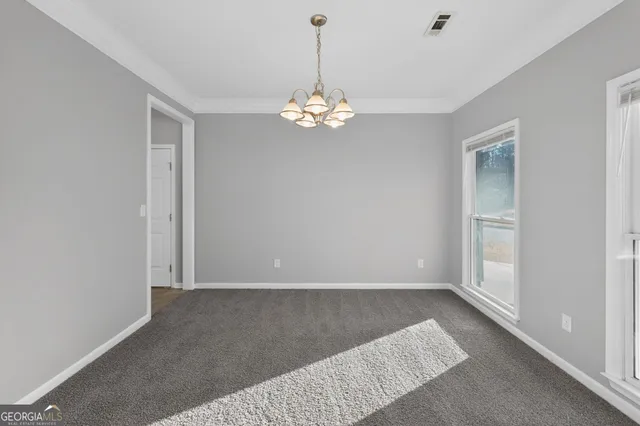 a view of an empty room with window