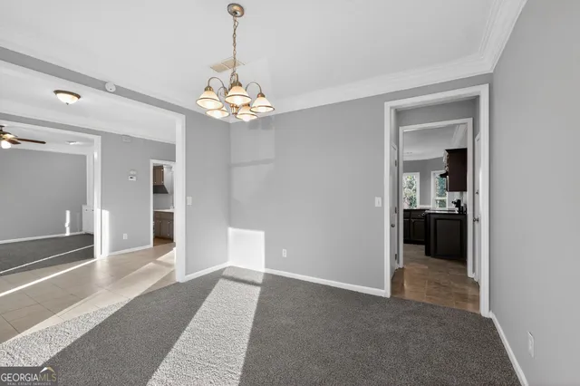 a view of a chandelier in a room