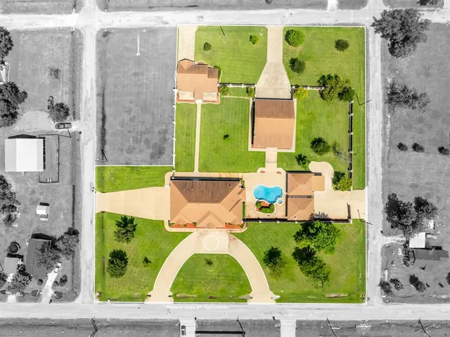 a view of a livingroom with a hardwood floor and a ceiling fan