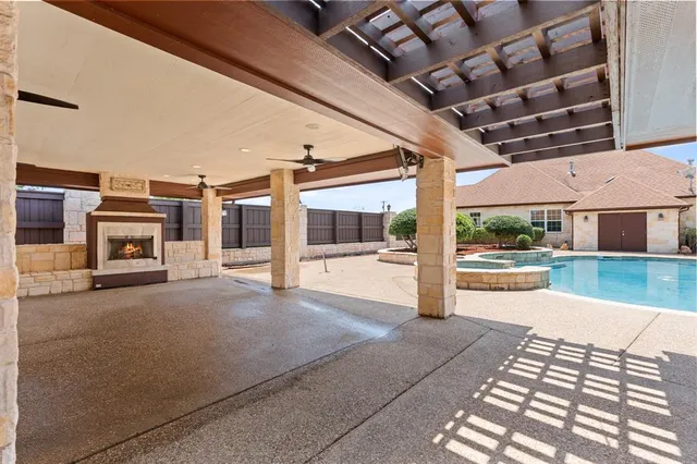 a view of a building with car parked