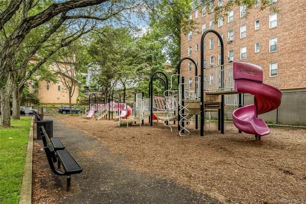 a view of outdoor space with seating area and trees