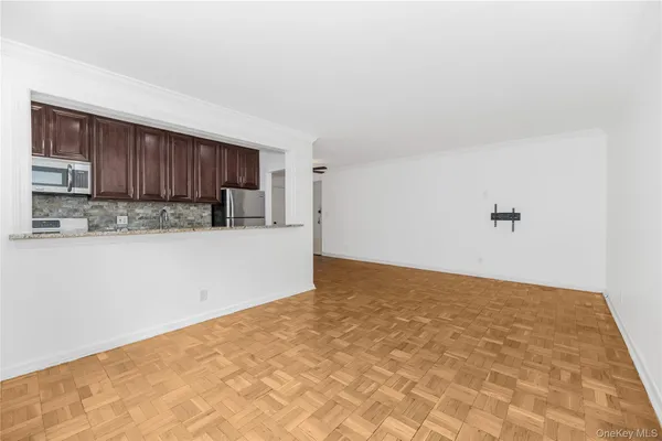 a view of a kitchen with a sink