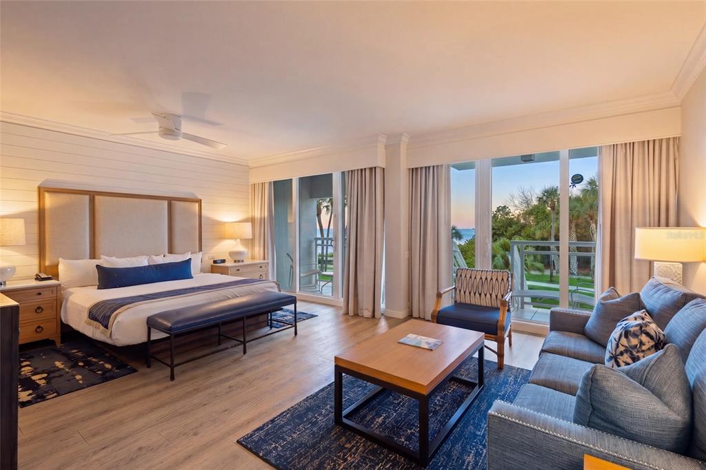 240 Sands Point Road, Unit 4104 Longboat Key, FL 34228 - Photo 6 of 47 a living room with furniture and a window