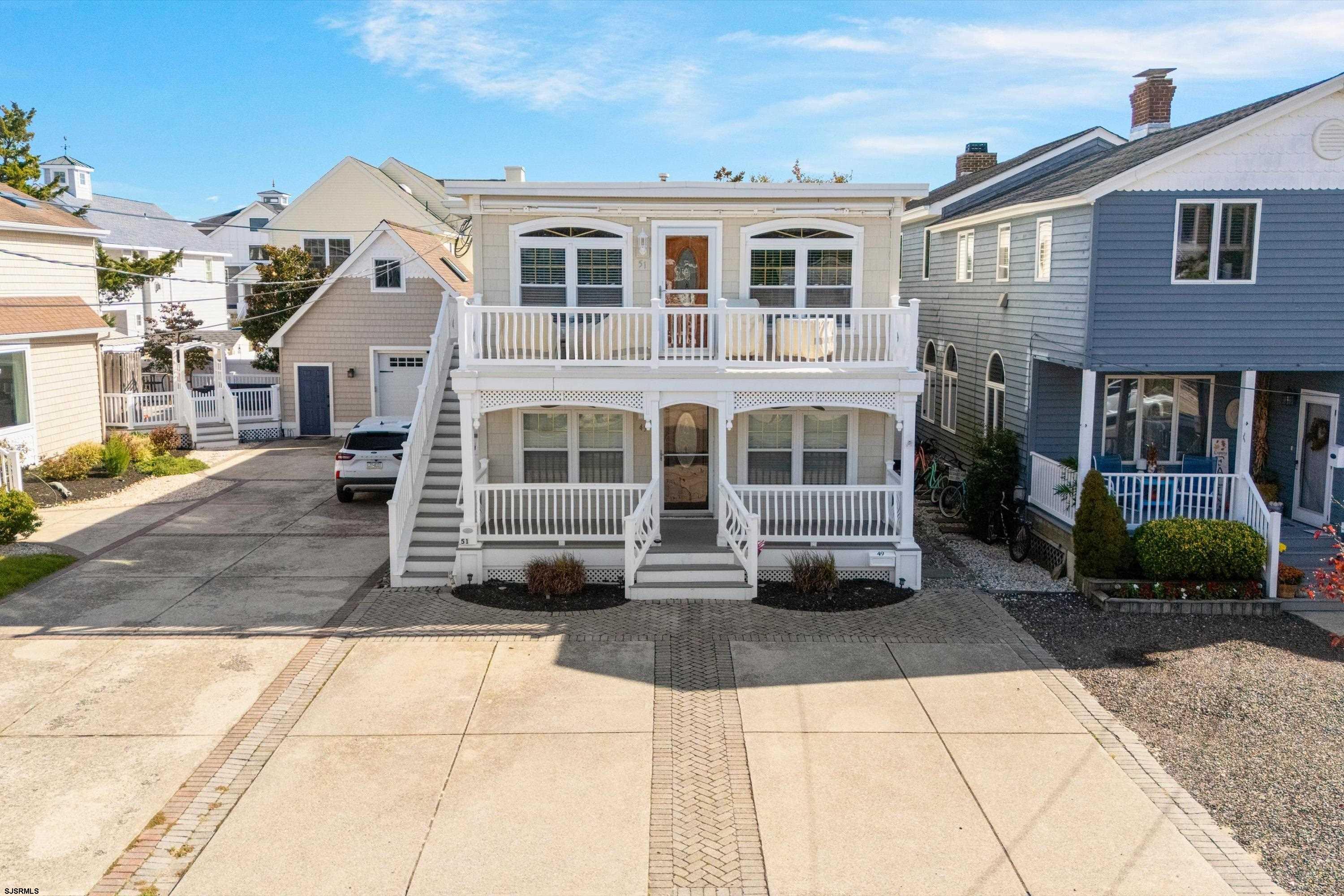 51 Simpson Road, Unit 2 Ocean City, NJ 08226 - Photo 39 of 43 a front view of a house with a yard