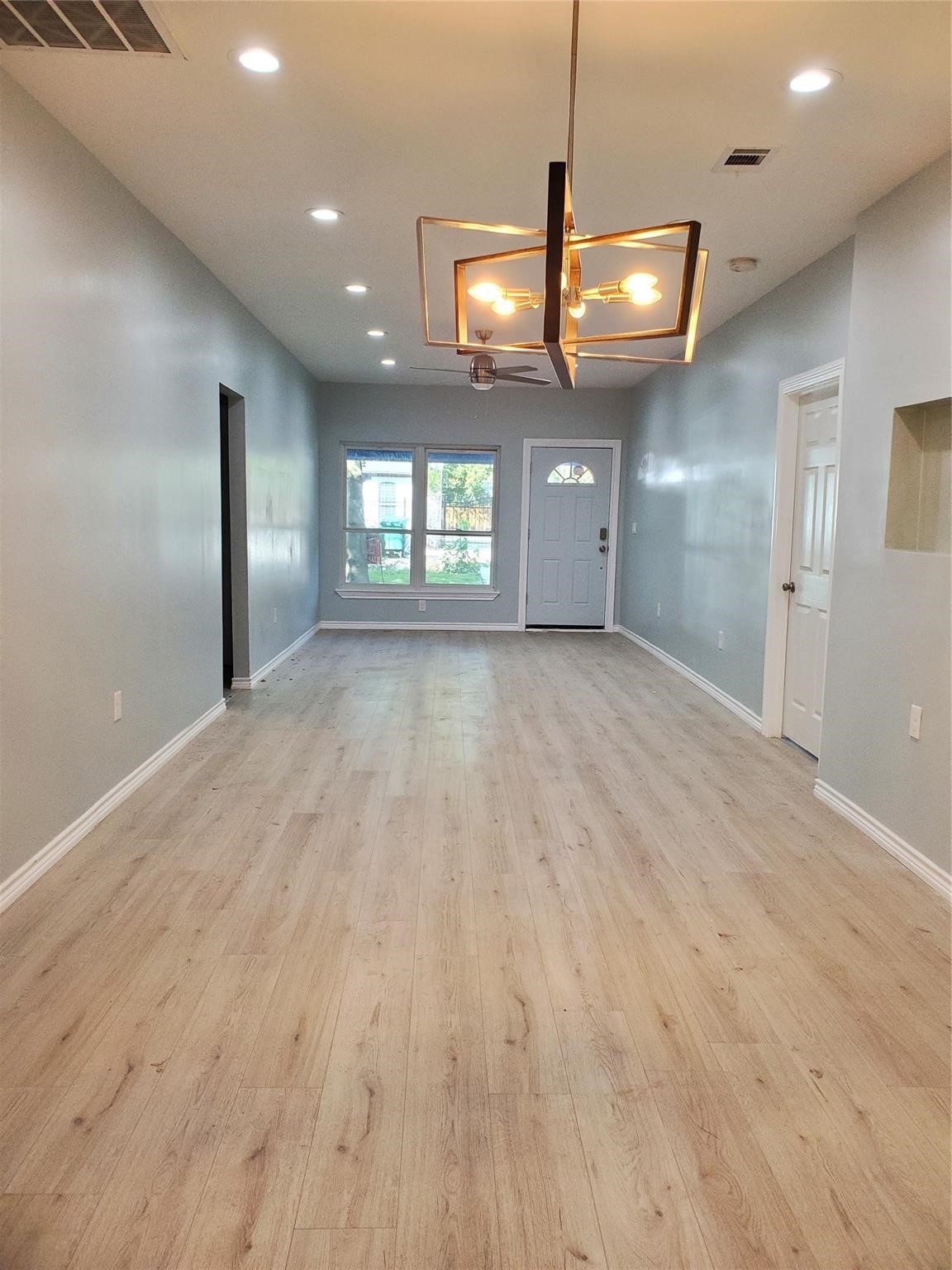 6815 Sidney Street Houston, TX 77021 - Photo 8 of 14 a view of an empty room and window