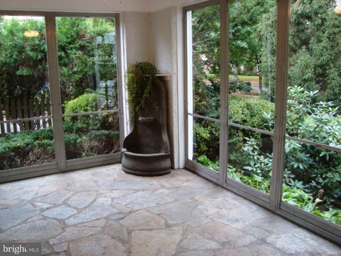 105 Midhurst Road Baltimore, MD 21212 - Photo 17 of 24 Interior (General) sun room with stone floor