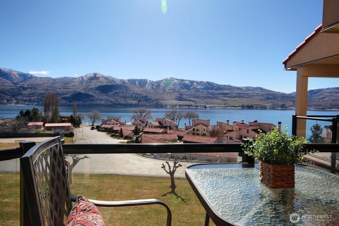 100 Lake Chelan Shores Drive, Unit 189 Chelan, WA 98816 - Photo 1 of 37 a terrace with outdoor seating and city view