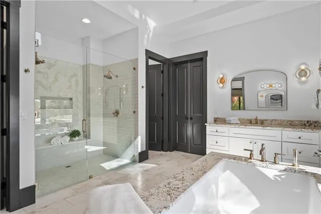 a bed room with a bed and a window