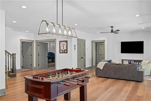 a view of a room with wooden floor