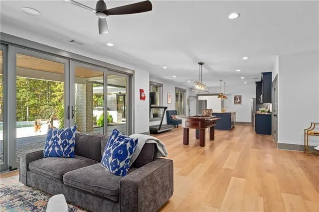 a living room with furniture and a rug
