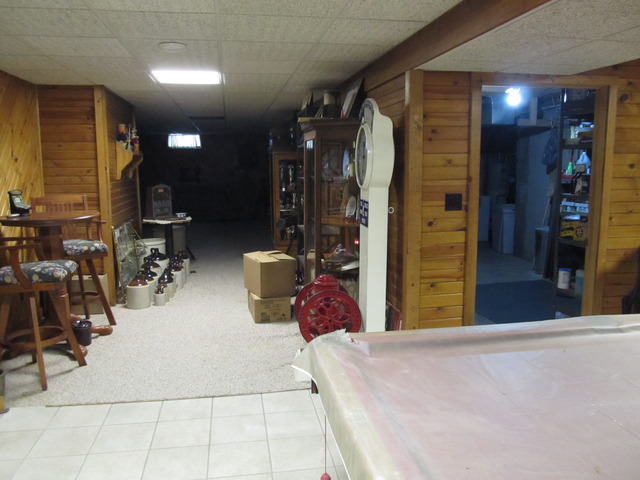 83 North 43rd Road Mendota, IL 61342 - Photo 19 of 25 a bedroom with double bed and a large mirror