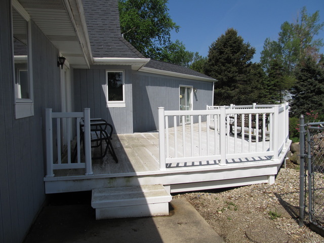 83 North 43rd Road Mendota, IL 61342 - Photo 24 of 25 a view of a house with a wooden deck