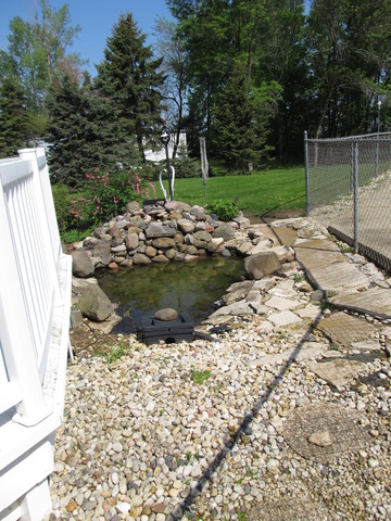 83 North 43rd Road Mendota, IL 61342 - Photo 25 of 25 a view of a garden with a fountain