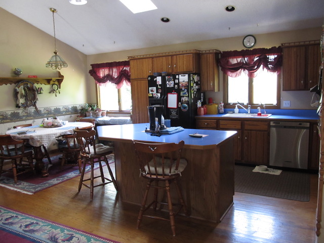 83 North 43rd Road Mendota, IL 61342 - Photo 5 of 25 a view of a dining room with furniture and wooden floor