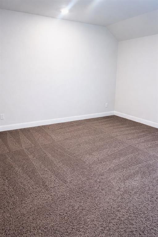 6825 Entwistle Road Frisco, TX 75034 - Photo 22 of 25 This room features plush, neutral-toned carpet, crisp white walls, and recessed lighting