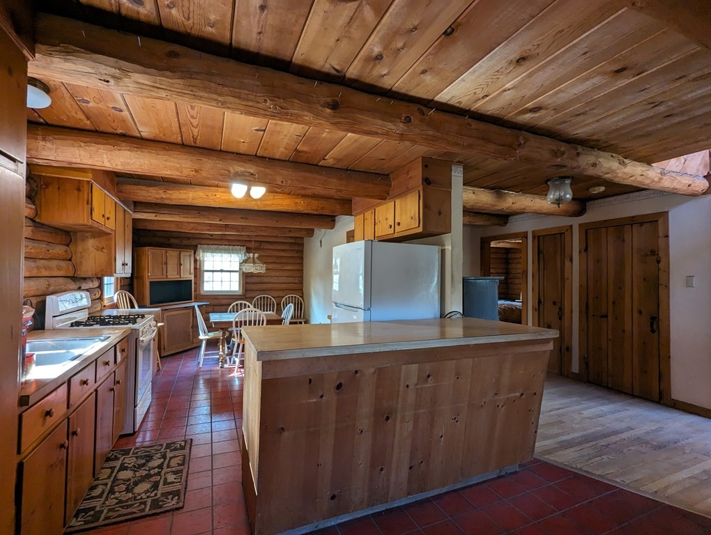 1183 Townsend Road Mason, NH 03048 - Photo 12 of 32 a view of a kitchen with furniture and a kitchen