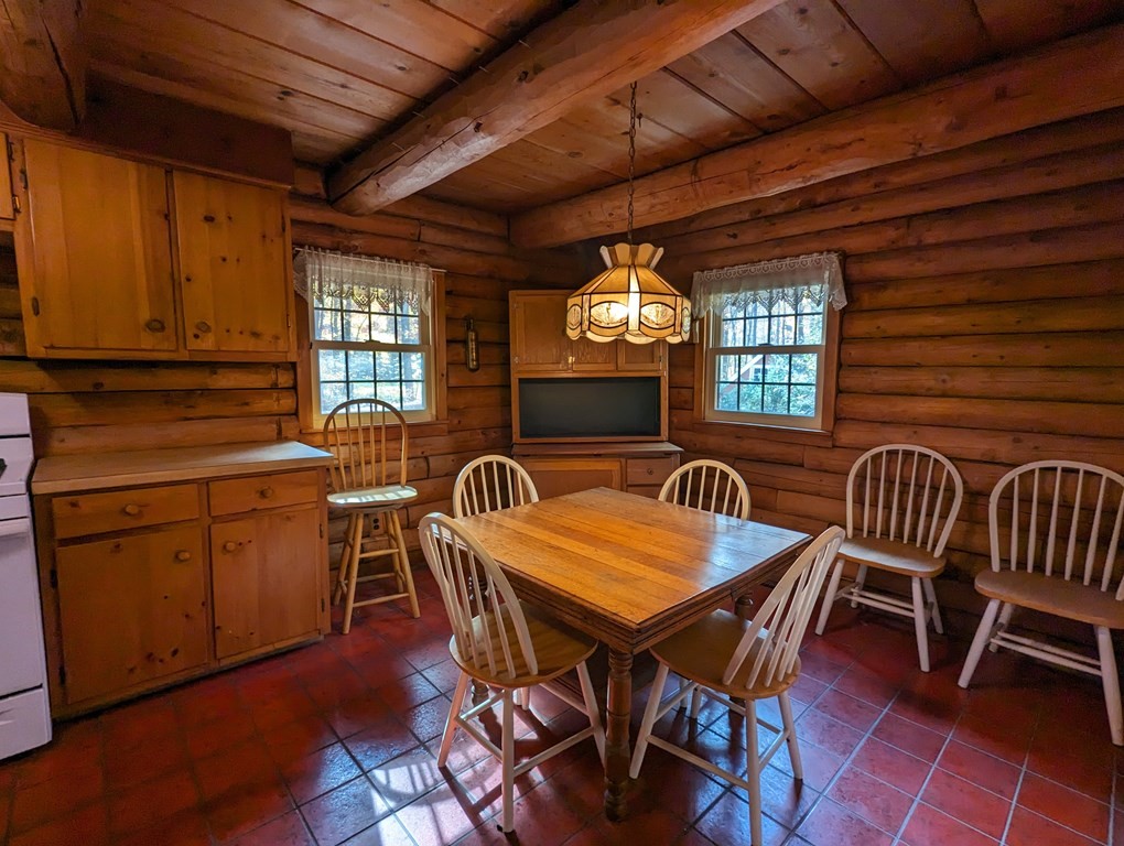 1183 Townsend Road Mason, NH 03048 - Photo 14 of 32 a view of a dining room with furniture window and wooden floor