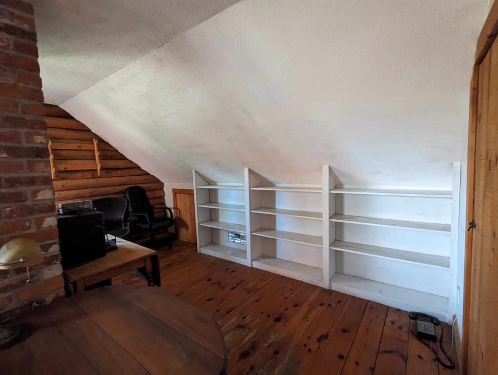 1183 Townsend Road Mason, NH 03048 - Photo 25 of 32 a view of a livingroom with furniture and staircase