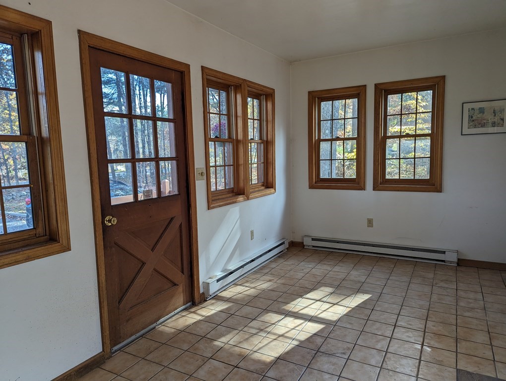 1183 Townsend Road Mason, NH 03048 - Photo 8 of 32 an empty room with windows