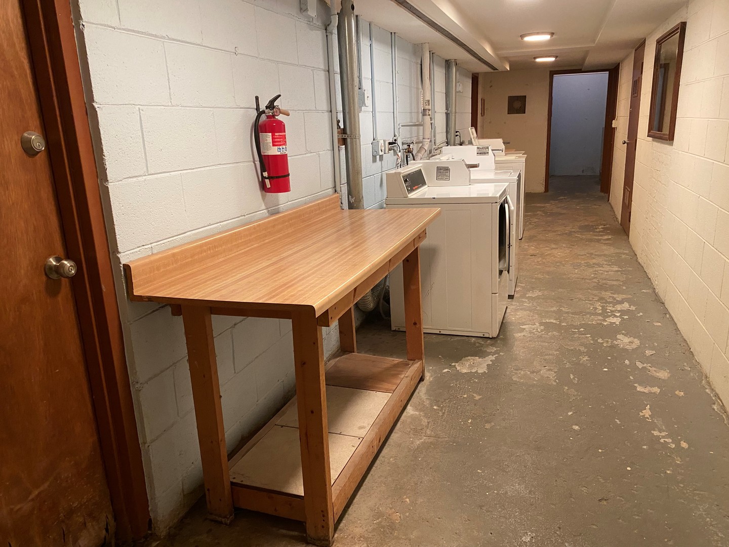 5815 North Spaulding Avenue, Unit 2C Chicago, IL 60659 - Photo 15 of 20 a view of a kitchen with fridge and workspace