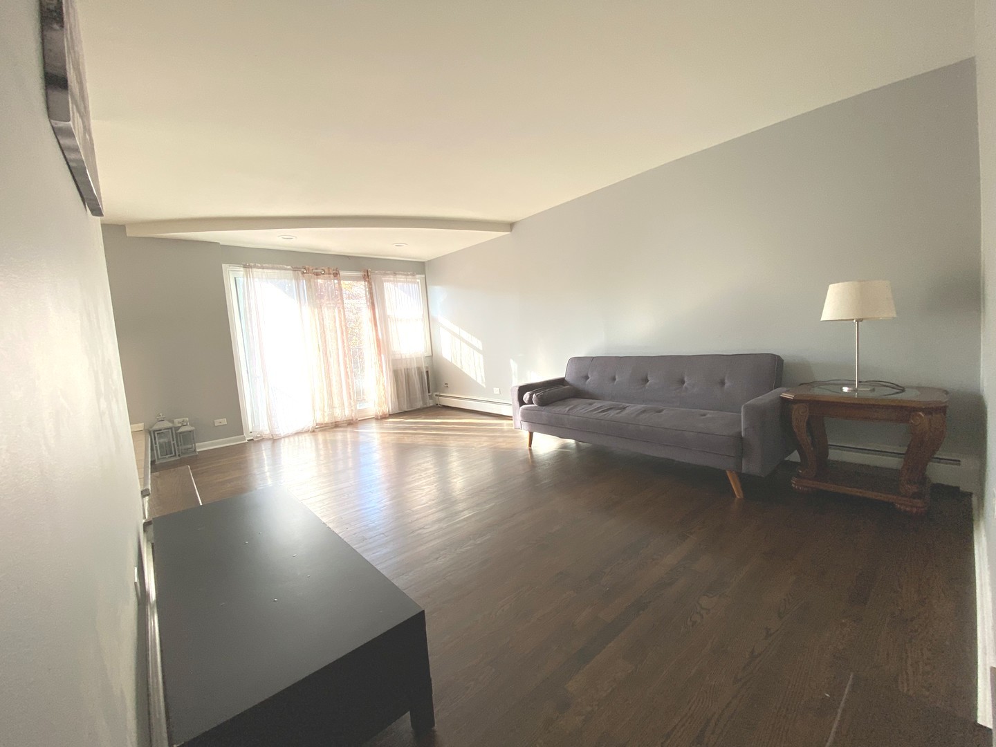 5815 North Spaulding Avenue, Unit 2C Chicago, IL 60659 - Photo 3 of 20 a view of livingroom and hardwood