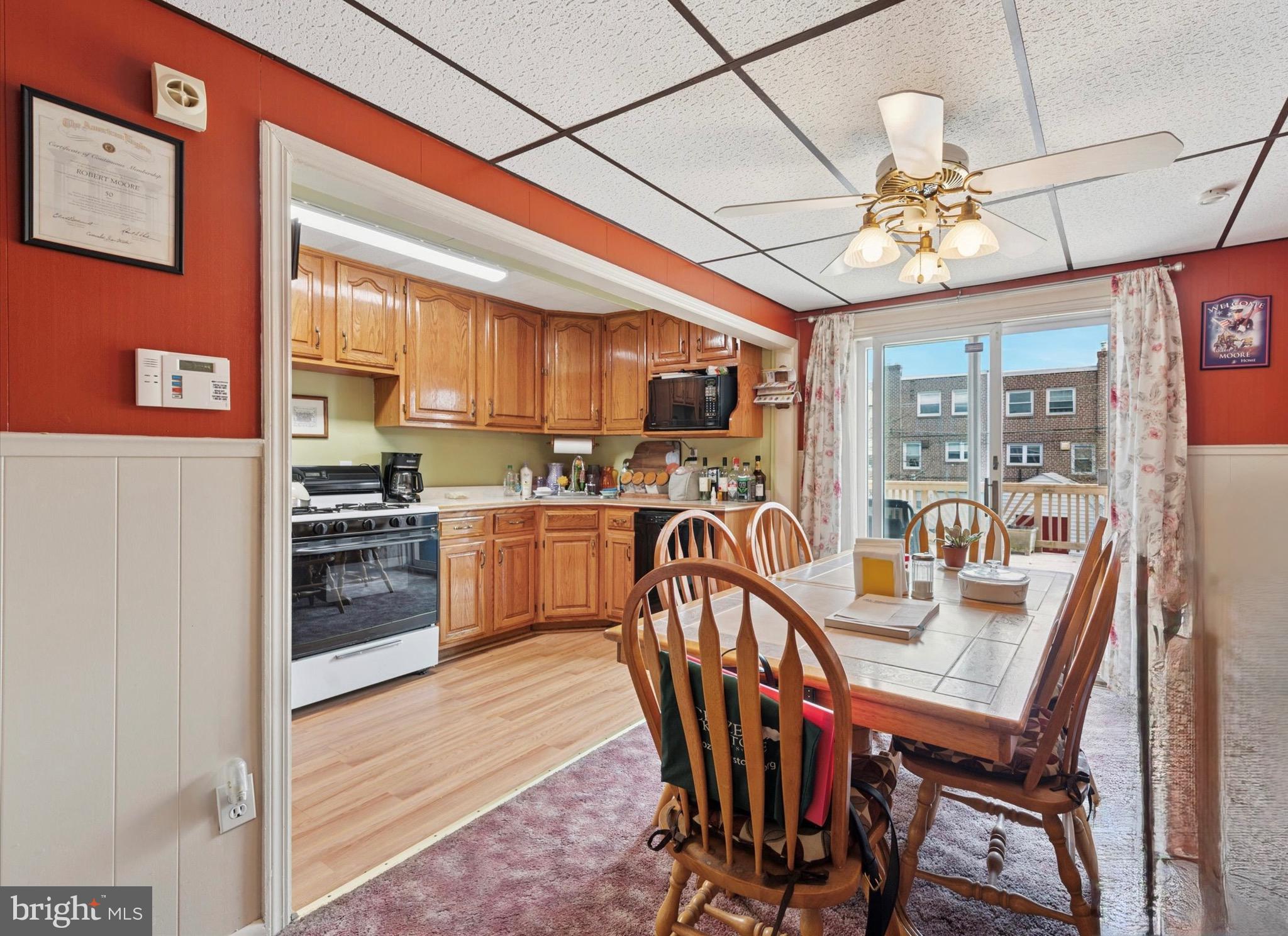 2015 Carter Road Folcroft, PA 19032 - Photo 7 of 15 a view of a dining room with furniture a chandelier and kitchen view