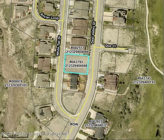 a view of a city with mountains in the background