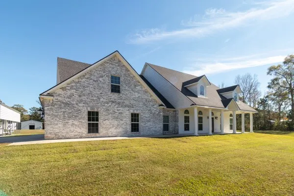 a view of a house with swimming pool