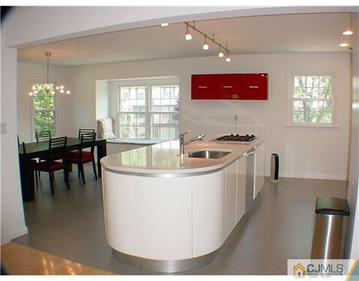 4507 Stonehedge Road Edison, NJ 08820 - Photo 4 of 10 a living room with furniture and a large window