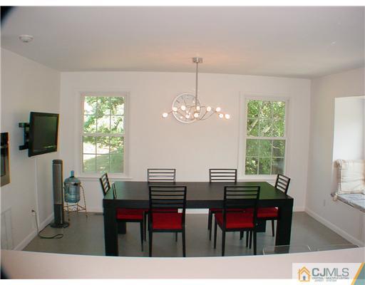 4507 Stonehedge Road Edison, NJ 08820 - Photo 6 of 10 a view of a dining room with furniture and window