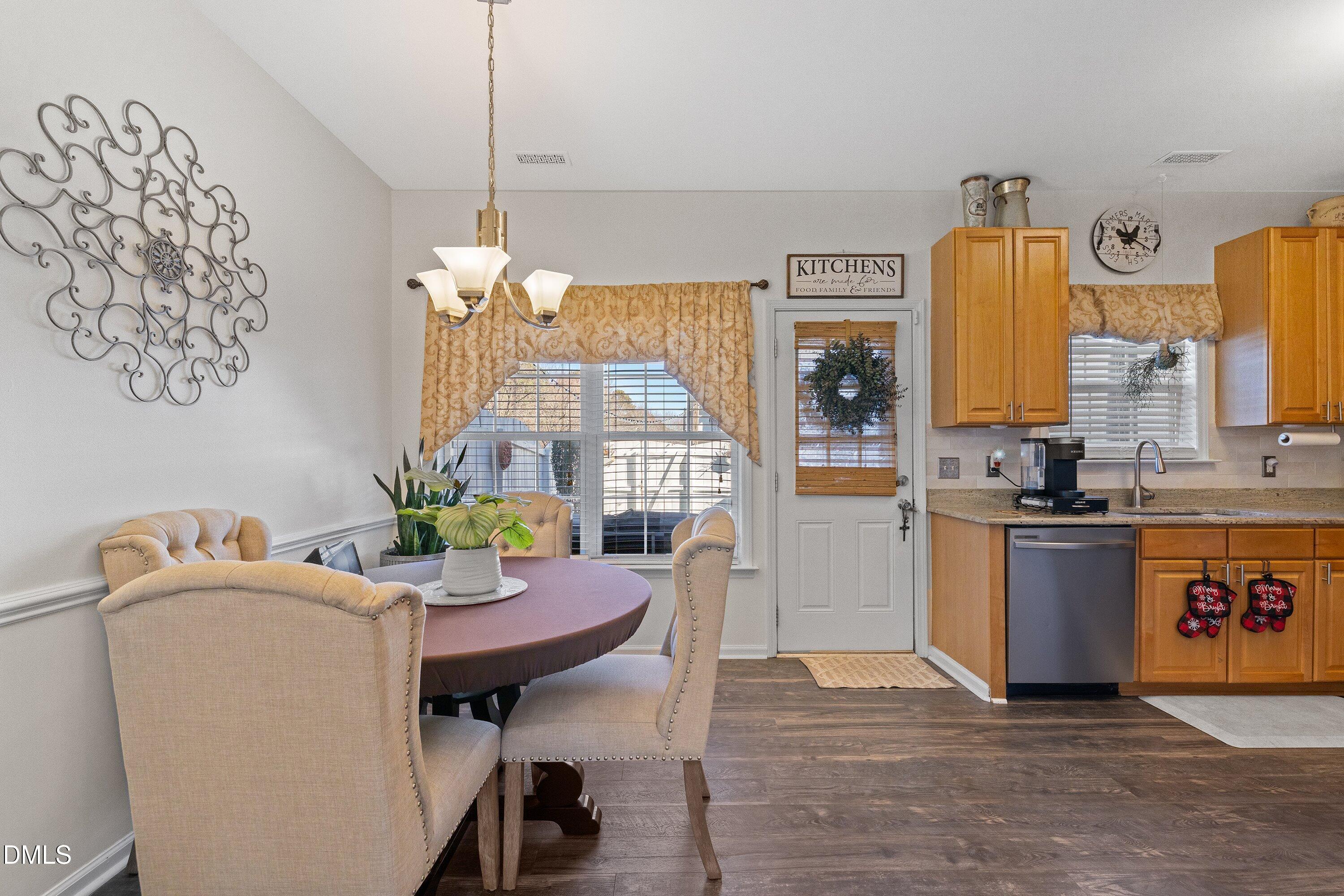201 Dairy Road Clayton, NC 27520 - Photo 10 of 31 a dining room with furniture and window