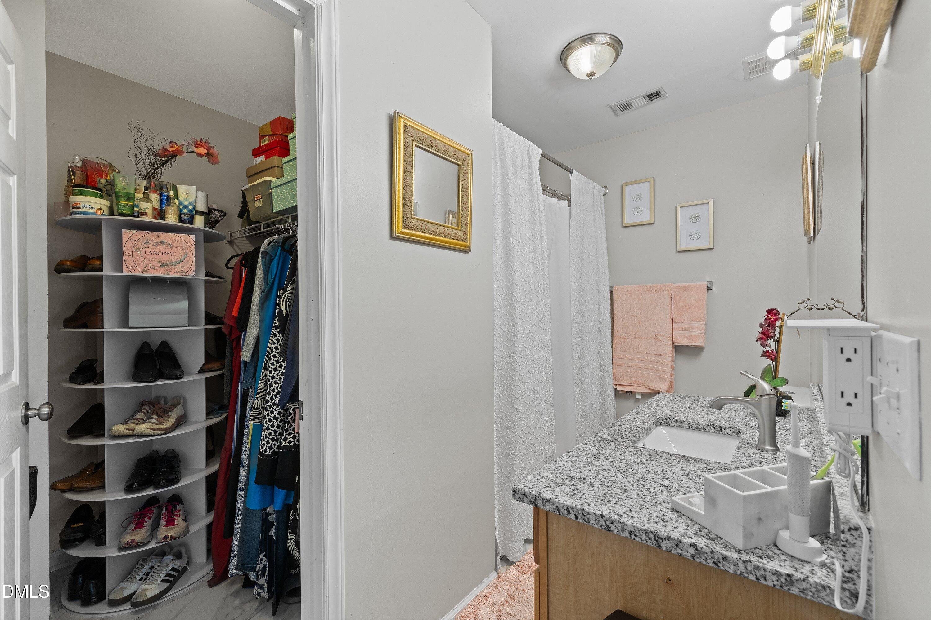 201 Dairy Road Clayton, NC 27520 - Photo 25 of 31 a view of bathroom sink and a mirror