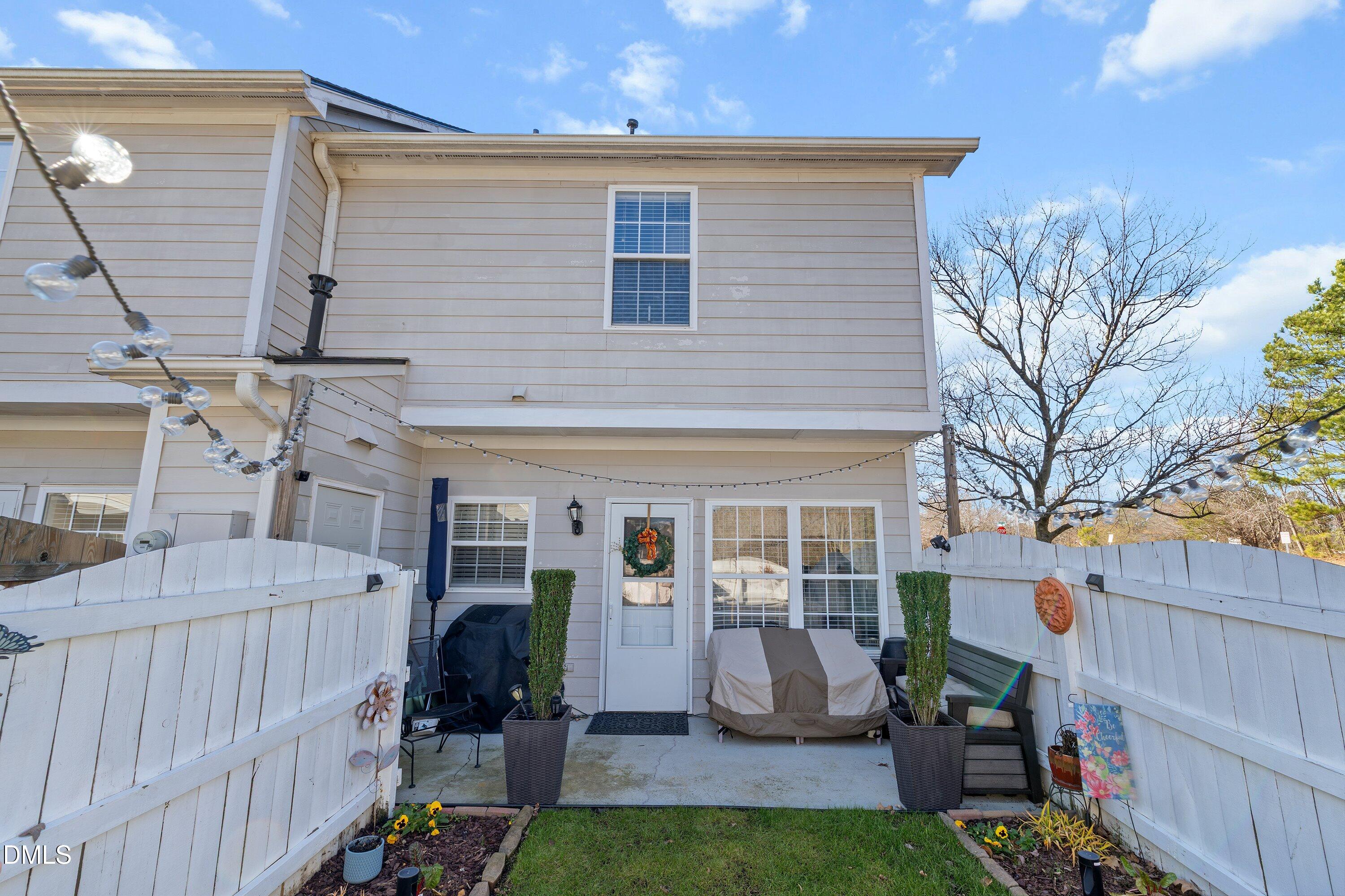 201 Dairy Road Clayton, NC 27520 - Photo 28 of 31 a view of a porch with furniture and garden