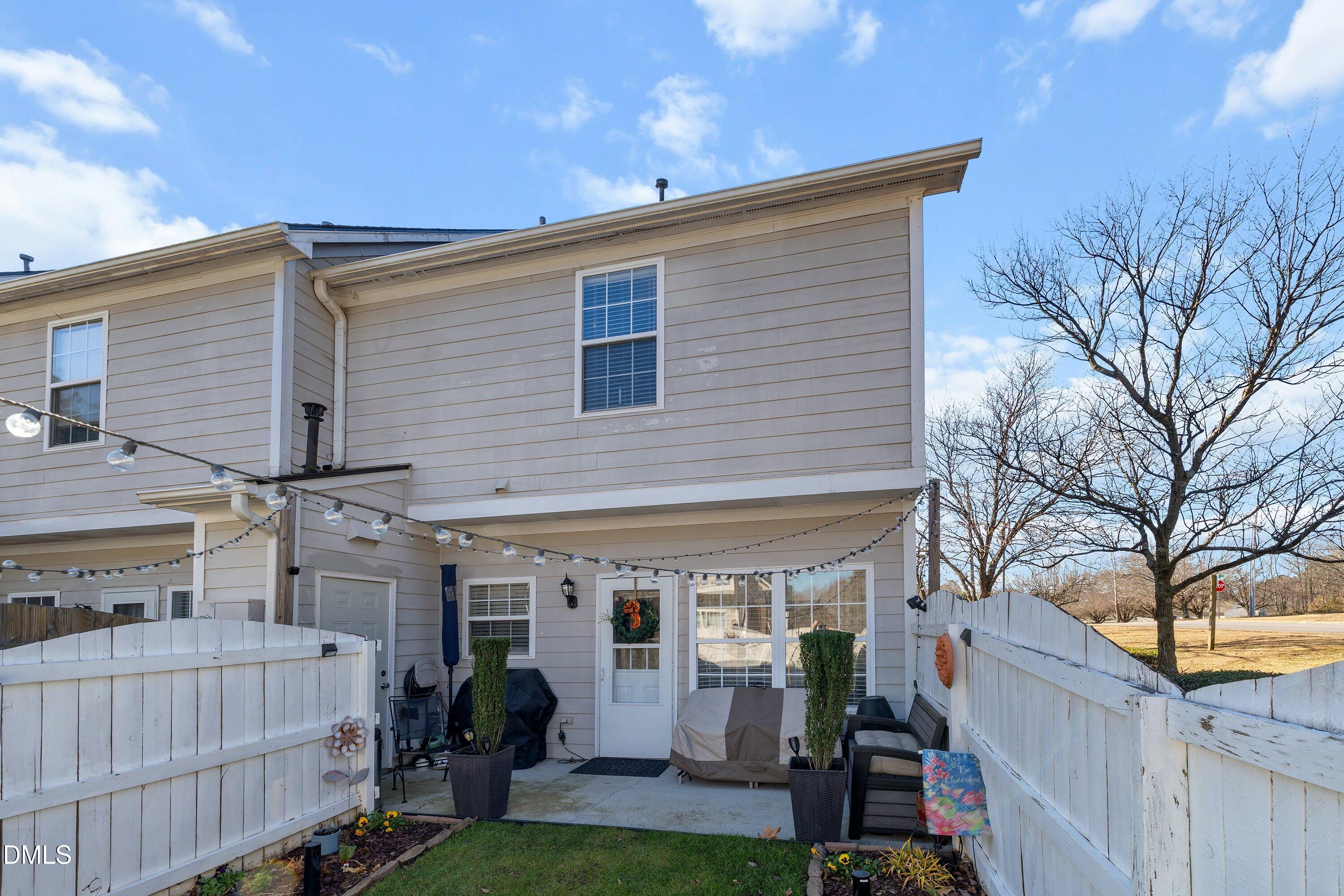 201 Dairy Road Clayton, NC 27520 - Photo 29 of 31 a view of a house with a backyard