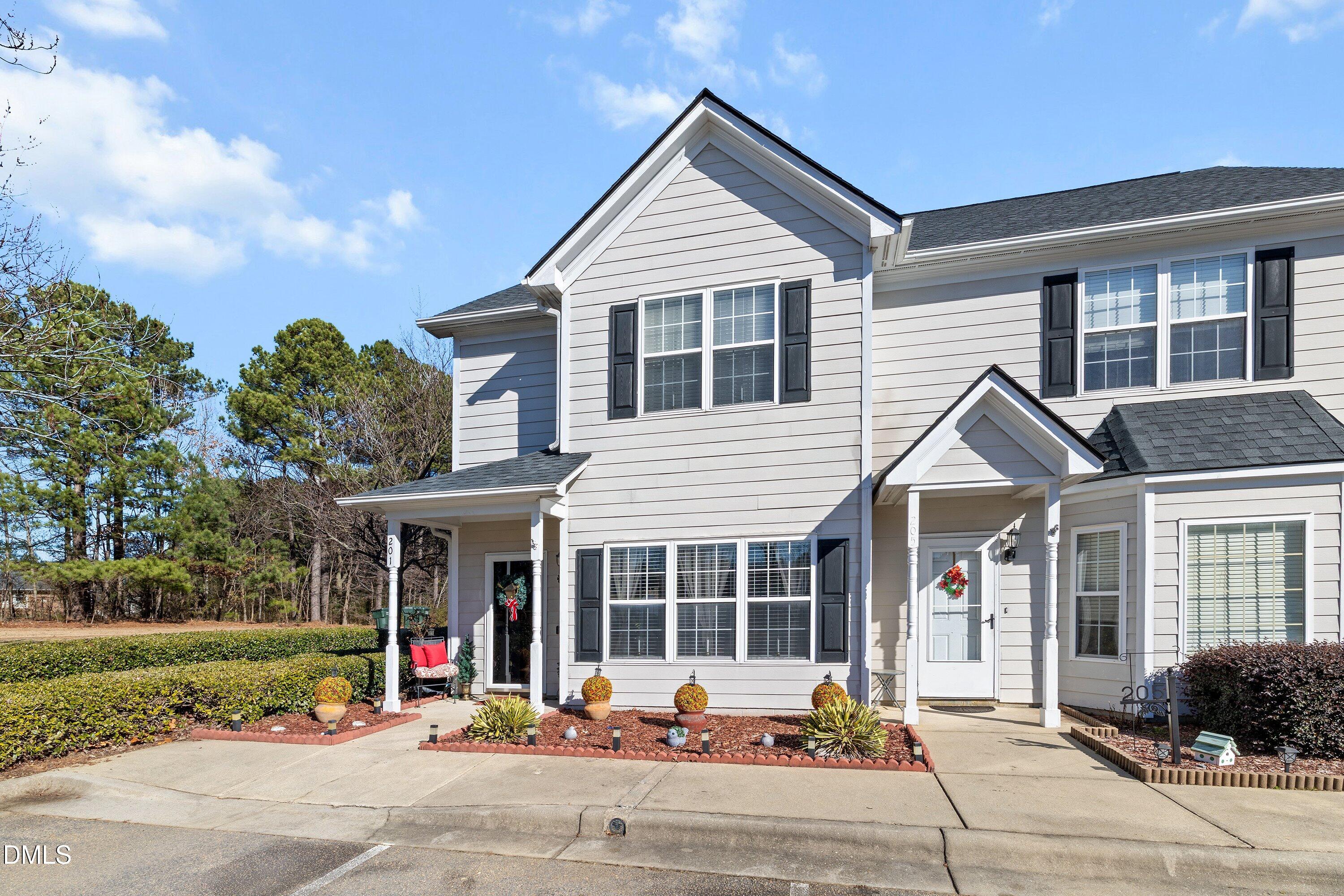 201 Dairy Road Clayton, NC 27520 - Photo 4 of 31 front view of a house with a patio