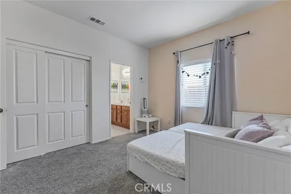 a living room with furniture and window