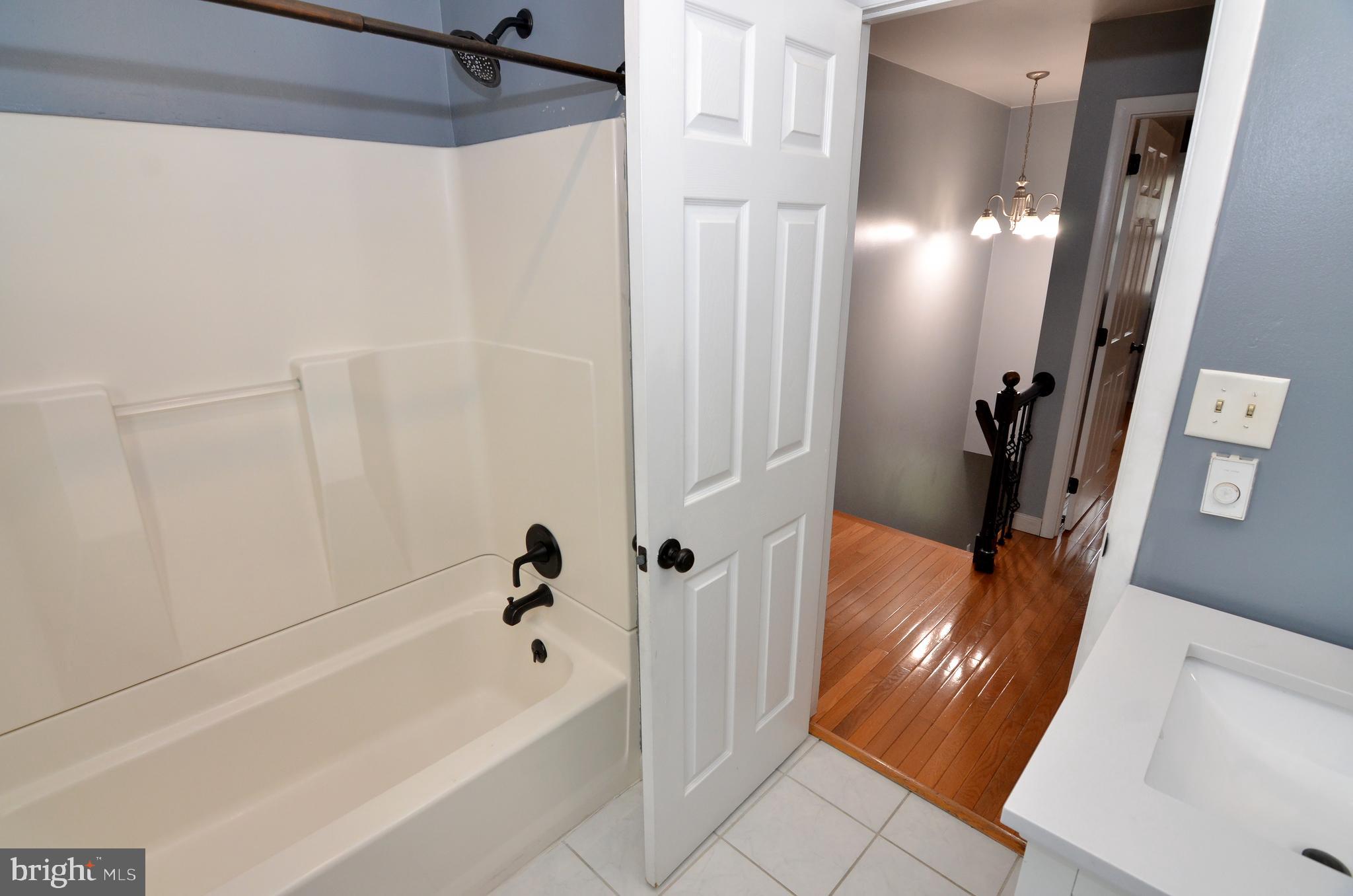 116 Turnbridge Drive Lancaster, PA 17603 - Photo 22 of 41 a bathroom with a tub a sink and a shower