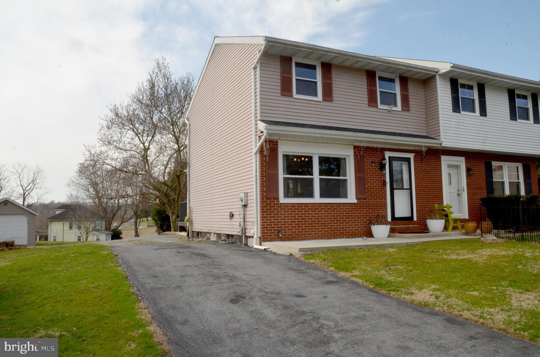116 Turnbridge Drive Lancaster, PA 17603 - Photo 3 of 41 a front view of building with yard and green space