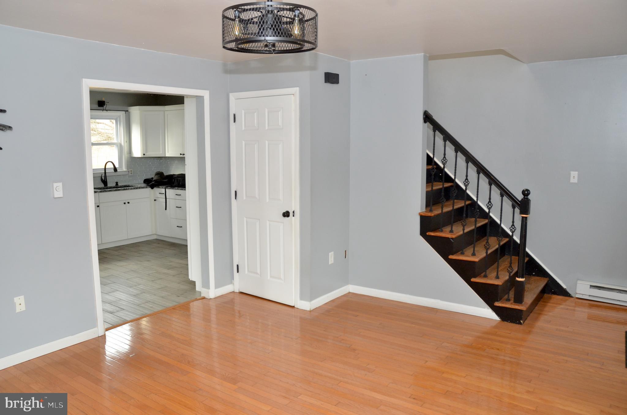 116 Turnbridge Drive Lancaster, PA 17603 - Photo 6 of 41 a view of an entryway with wooden floor and staircase