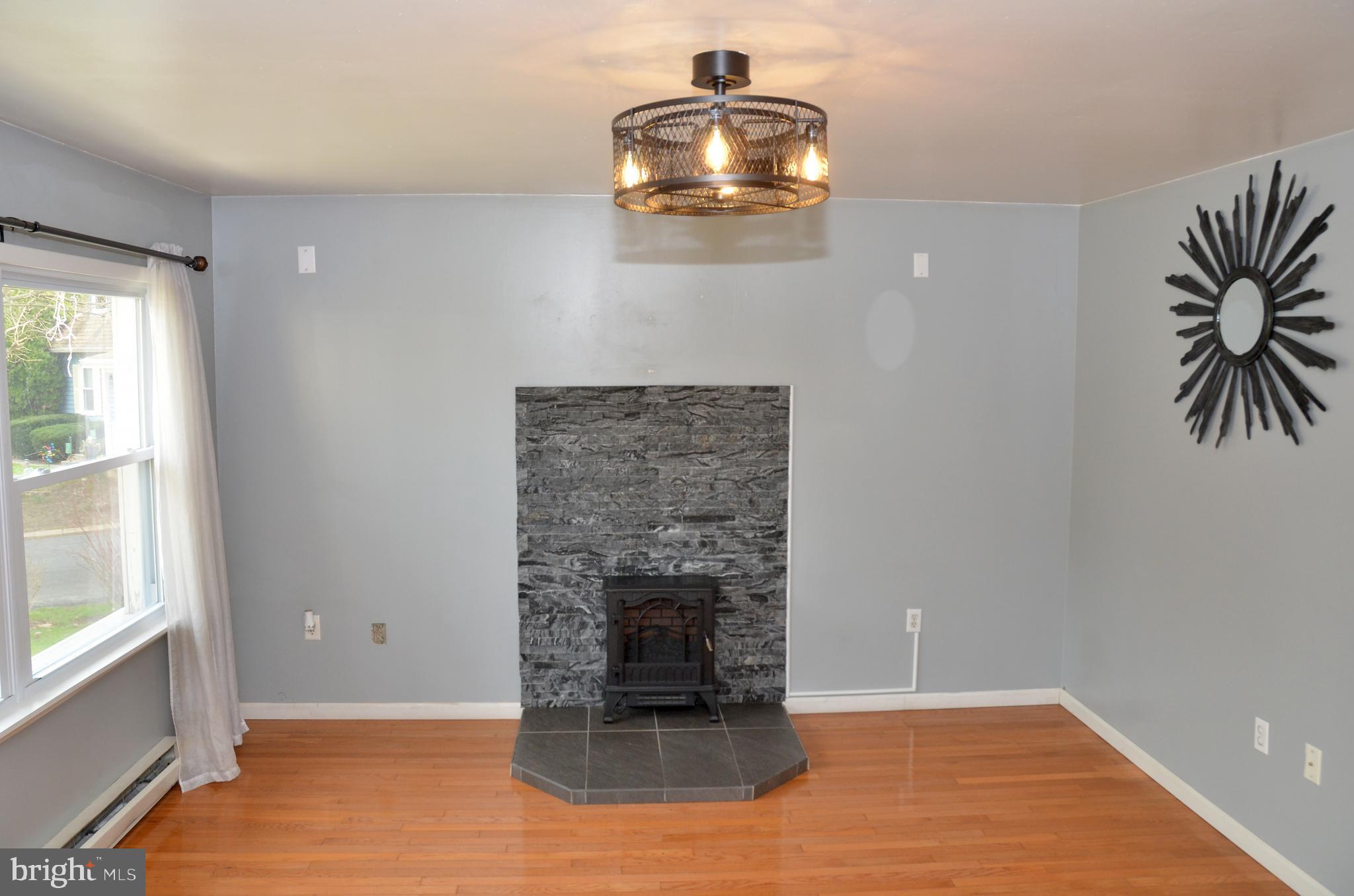 116 Turnbridge Drive Lancaster, PA 17603 - Photo 10 of 41 an empty room with a fireplace